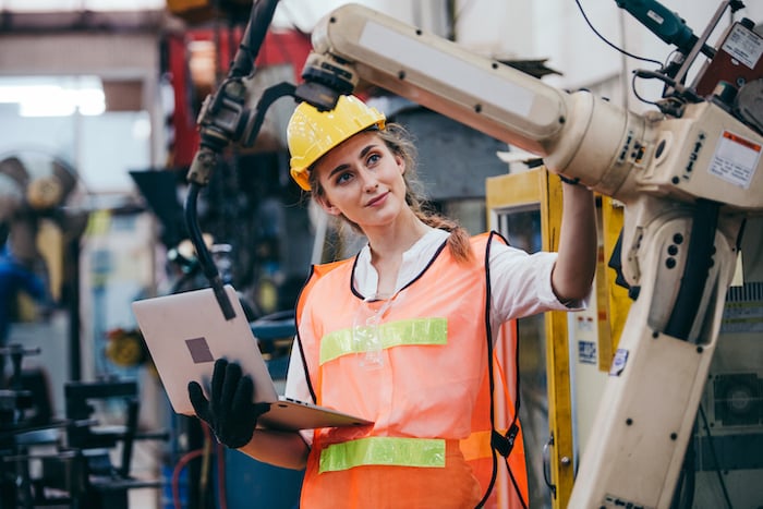 A technician inspecting a mission critical asset to inform preventive maintenance schedules